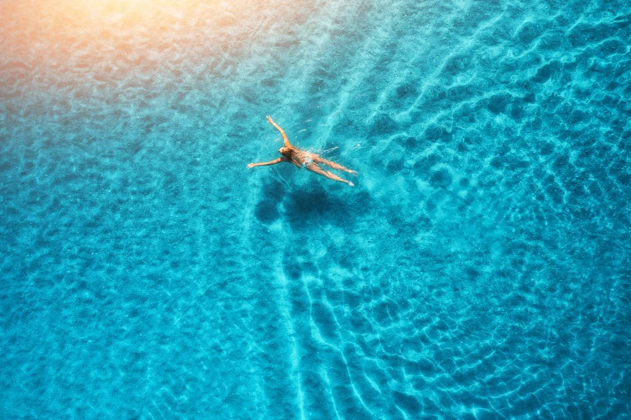 A serene beach with crystal clear waters.